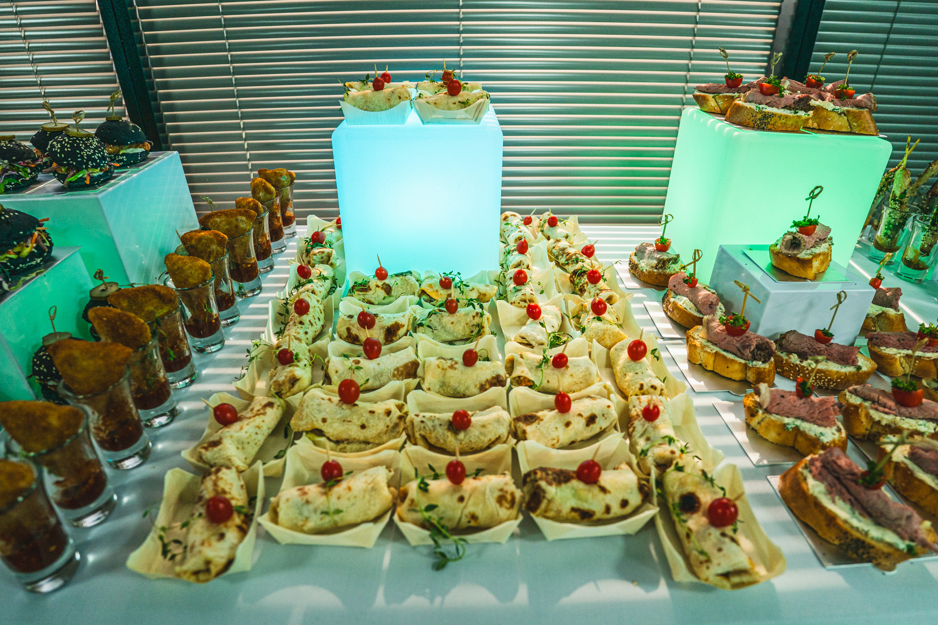 A colourful Toast Office catering spread with wraps and savoury bites